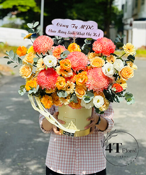 giỏ hoa tone cam hồng rực rỡ