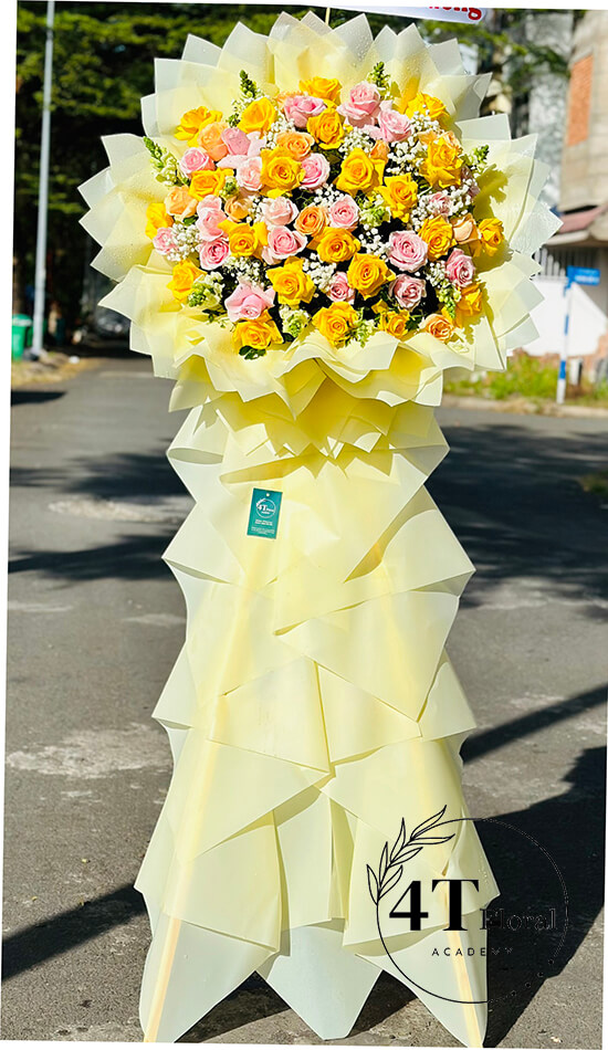 kệ hoa chúc mừng tone vàng hồng